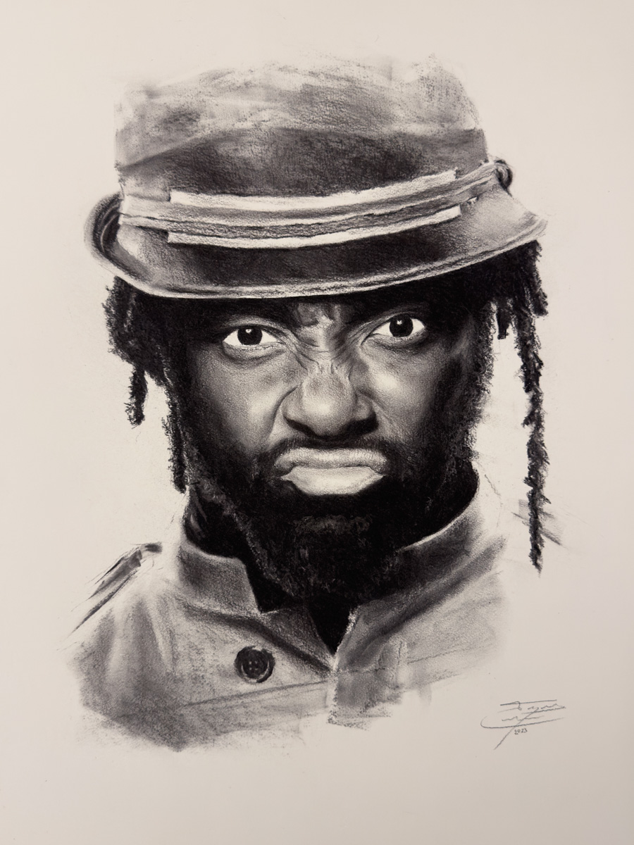 Charcoal portrait of Will.I.Am by Enrique Cordero